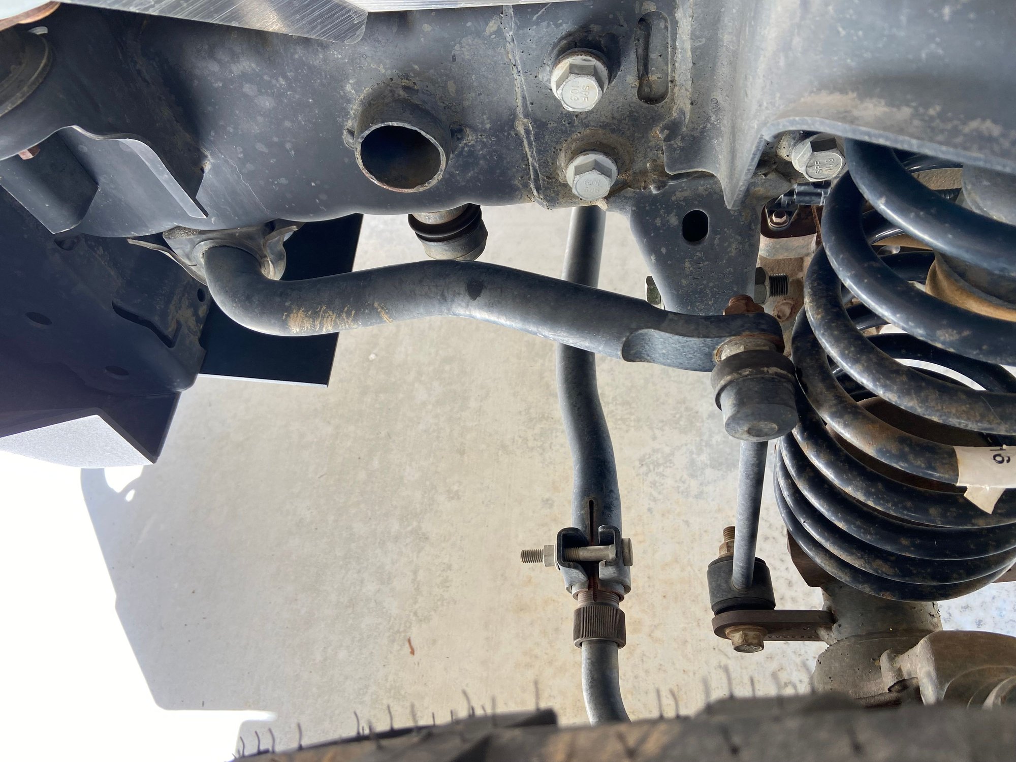 Sway bar end link hitting spring? The top destination