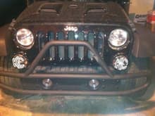 The Olympic 4X4 Cobra bumper with KC lights.