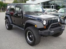 09 Rubicon This is my new Jeep and yes that is at the dealership. don't judge me!
Right now it kicks butt, I have plans to make it bad a@#!
More to come
