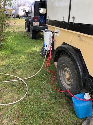 The water heater is Joolca continuos heat. Takes about 3 minutes to setup with all quick connectors