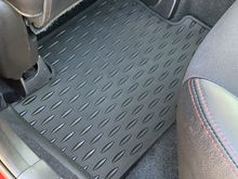 All-weather mats in front and back. Also includes original carpet mats (like new).