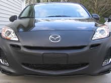 No Smile
2010 Mazda 3 black mica with front cover 3