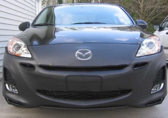 No Smile
2010 Mazda 3 black mica with front cover 3