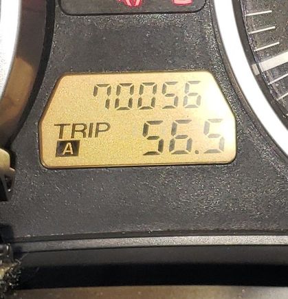 This is a picture of my odometer today. It looks like there is a place to the left of the 7 for another digit.  That would make it a six digit odometer.
What do you think?