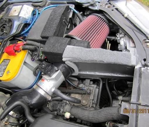 K&amp;N SRI=CAI 
Sealed from Hot Engine Compartment allows only Colder fresher air to get in.  I also later installed a water deflector shield in front of tire area to prevent splash up from puddles.