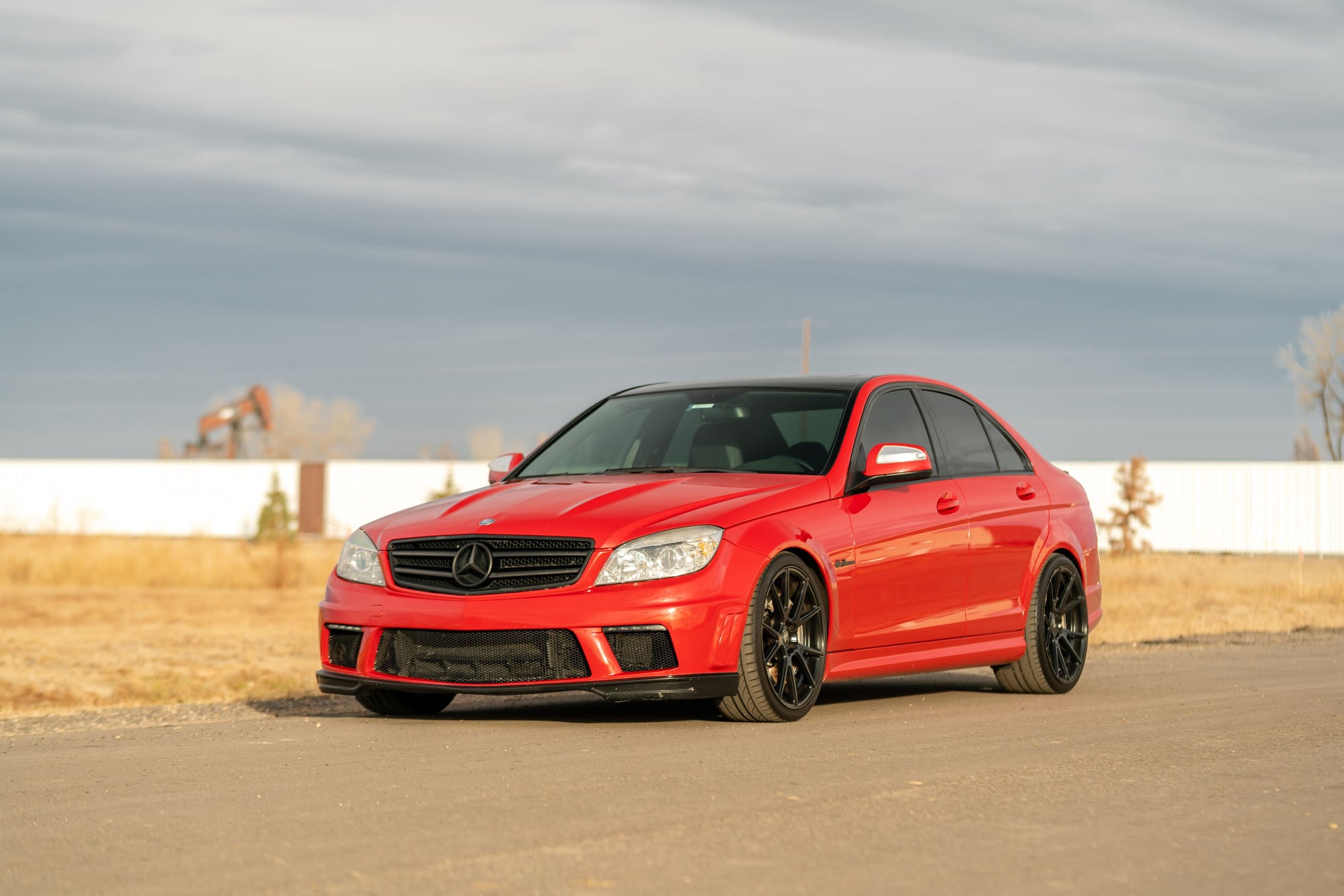 2009 Mercedes-Benz C63 AMG - Fire Opal Red 2009 Mercedes-Benz C63 AMG w/ P30 Package - Used - VIN WDDGF77X69F323106 - 88,700 Miles - 8 cyl - 2WD - Automatic - Sedan - Red - Frederick, CO 80530, United States