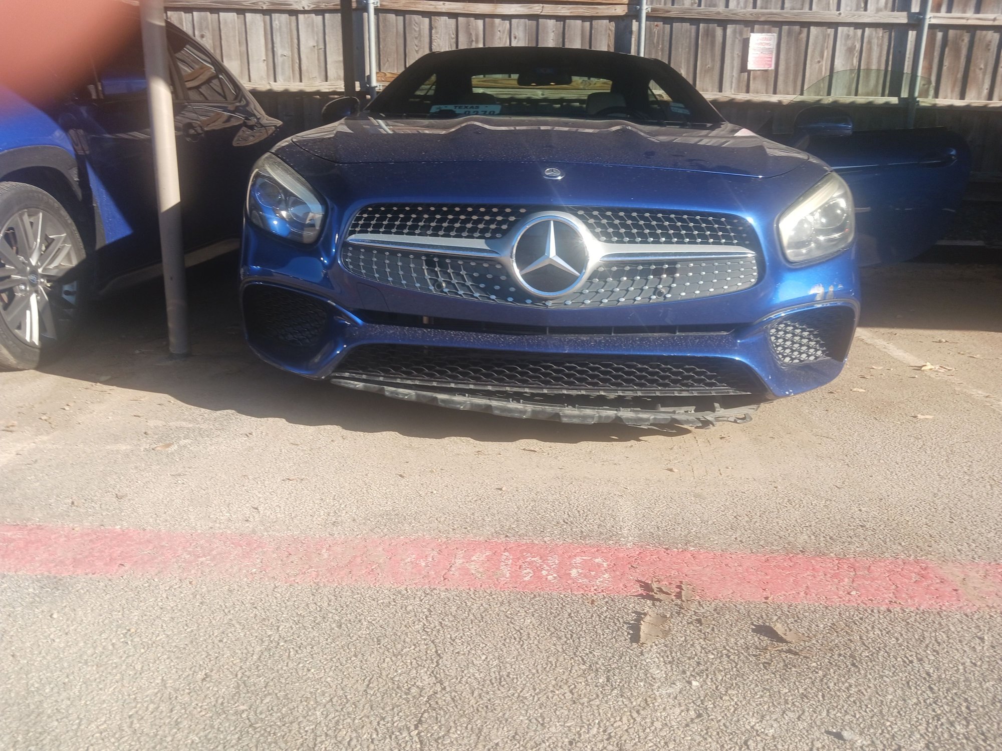 Does anyone know the part number for the bottom bumper lip and part which bolts on to hold the lip in place?