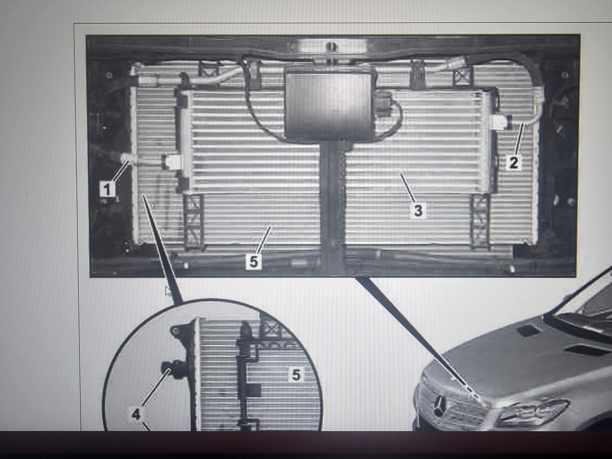 Transmission oil cooler just behind Distronic sensor