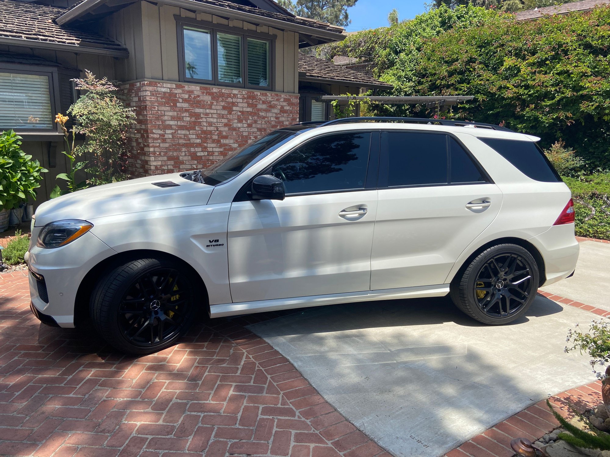 2013 Mercedes-Benz ML63 AMG - 2013 P30 Designo ML63 AMG - Used - VIN 4JGDA7EBXDA240959 - 73,000 Miles - 8 cyl - AWD - Automatic - SUV - White - Denver, CO 80207, United States