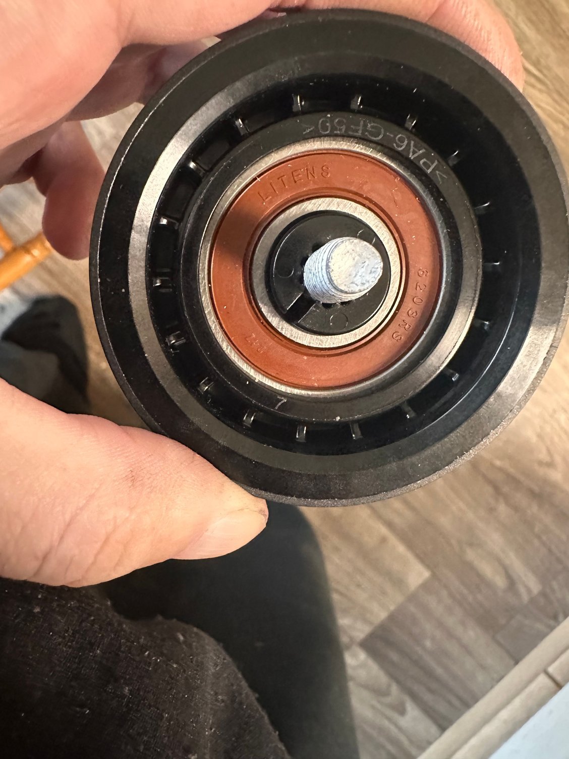 Is the ring supposed to be inside like this then install it or is that supposed to come off I keep getting different answers 