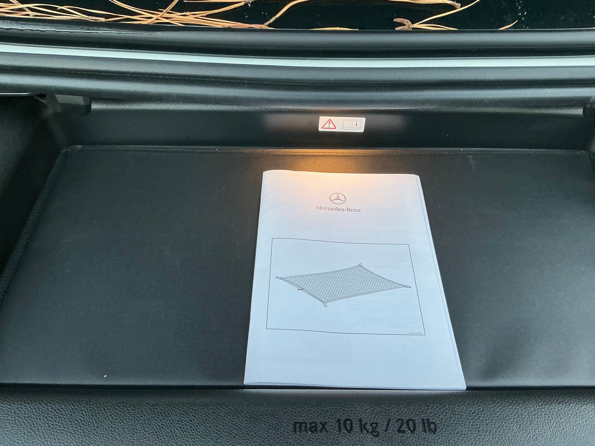 With the drawer pulled out. 