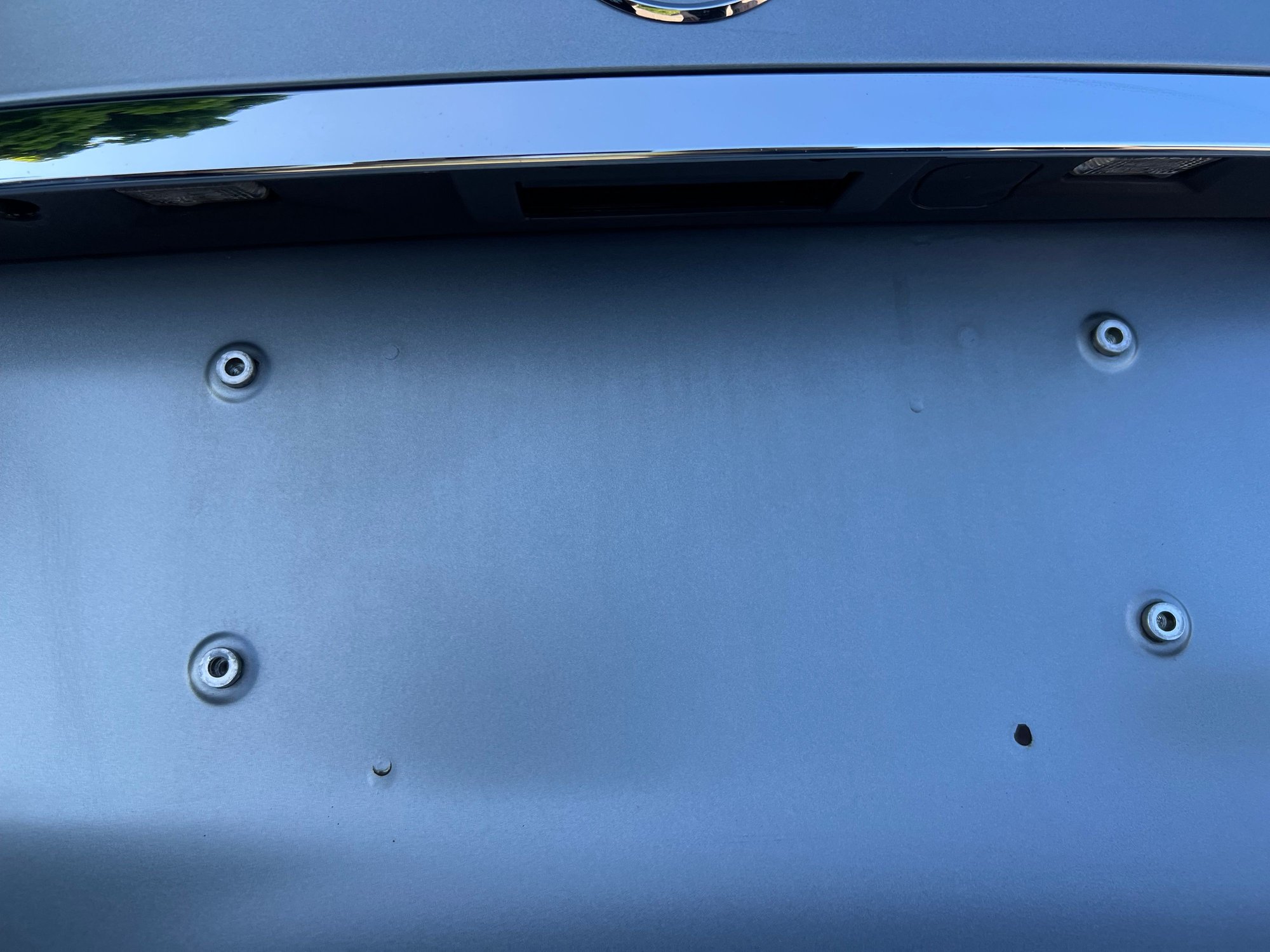 Magno Platinum Paint Rusting due to License Plate Bracket