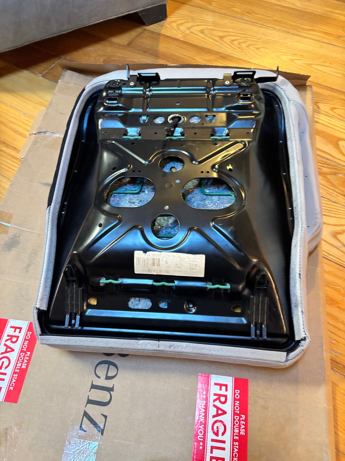 Process of removing the retaining clips from the seat shell.