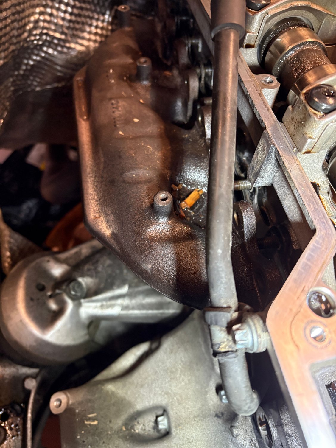 Exhaust manifold off (mostly). 
