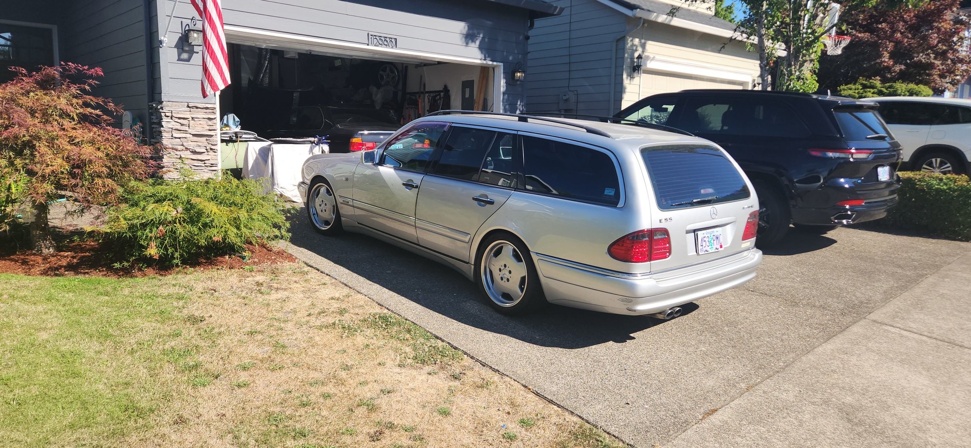 Fun wagon, can see one of my E34 M5s in the garage.