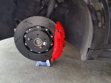 the new RacingBrake rotors (note coated black, coating will be taken off when setting the pads in)