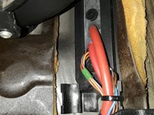 And then I saw the grommet block from the footwell area.. but that plastic/rubber plug is on this side too...