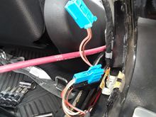 This is the door speaker harness plug... it matched the color scheme my car manual said....had to dig down  and pull it up and then I unsnapped it 