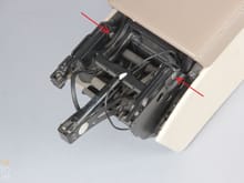 Is it the 2 bolts with locking washers all that hold the armrest/center console lid in place?
