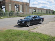 Part of the Studebaker factory in the back ground.  Being demolished.