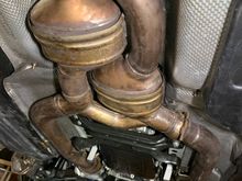 Here, on my 07’ E63, you can see the exhaust brackets that mount from the Rear Tranny mount bracket around the sides to each exhaust pipe.  ARH’s look like they actually have them built-in on their E63/CLK LTH offering.  The only thing I’m very concerned about is the sound of those bad boys being too loud?  Has anyone tried them while retaining both (4) Cats, resonator and mufflers?  Most everyone that has posted a video with them seems to have deleted one or more?  