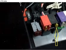 The yellow arrow points at the fuse for the PSE pump
