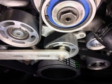 The supercharger pulley is now held tightly in the clutches of 2 billet aluminium machined pulleys...