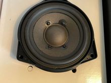 Here’s the stock center channel speaker resting on the cutout that held the Focal replacement. see a problem? 
