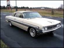 My first Real car in 1967. 1961 Oldsmobile Starfire.