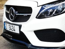 Front diamond grill. Distronic glass star. Front AMG double lip spoiler.