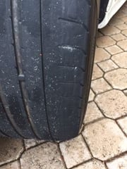 The tread on the passenger front tire is worn on the outside. What do I do?  - Quora