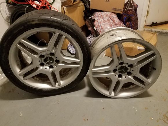 Stock 18' rear wheels. Minor bent to one,  and the other fixed crack. Inner side of wheel. If interest I can send a close pic. Need your phone number to do that. 