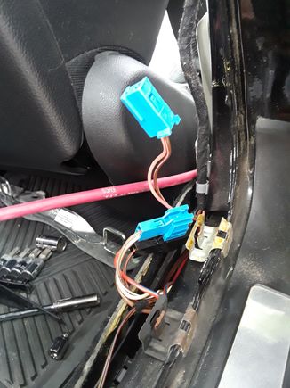 This is the door speaker harness plug... it matched the color scheme my car manual said....had to dig down  and pull it up and then I unsnapped it 