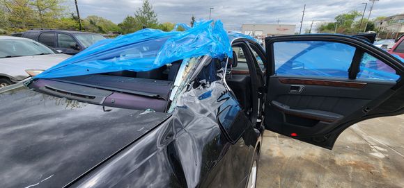 The bottom edge of the trailer smacked across the entire right side of my car. Shattering both right side windows and the rear window.