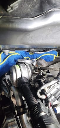 Before attempting to install the turbo end of the cooling lines, tuck a towel in the space below the lines, that way if you drop that bolt it doesn't fall into oblivion..




