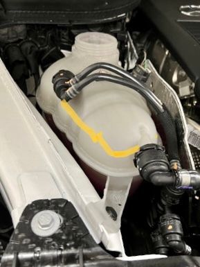 Had same issue with my GLE. Took it to dealer they filled it up to where yellow line is. Been fine for a year now no yellow light has come on. 