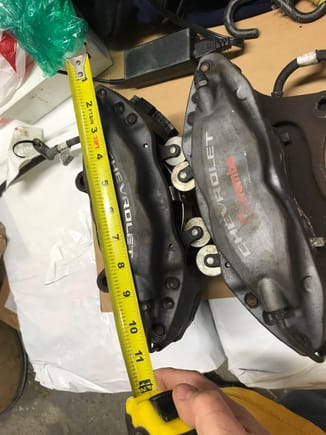 This is how the front camaro calipers and pads are. They have lead weights on the calipers and pads. Those had to go to clear. 
