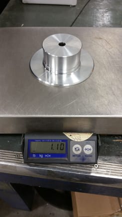 This is the weight of the pulley before cutting the pulley grooves, so I think the weight came down to almost exactly 1lb even.
