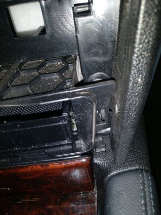 Here's a clip on the dash, bottom corner.