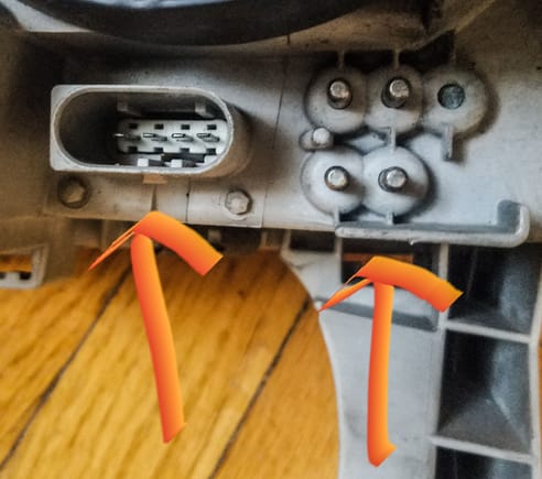 Ok when disconnecting the head lights i noticed they're connected by a main plug on the harness(right arrow) and if i remember correctly the (left arrow) was connected to what i would assume a ballast (silver box)