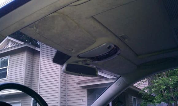 Alcantra suede headliner with upgraded overhead control panel with wood trim.