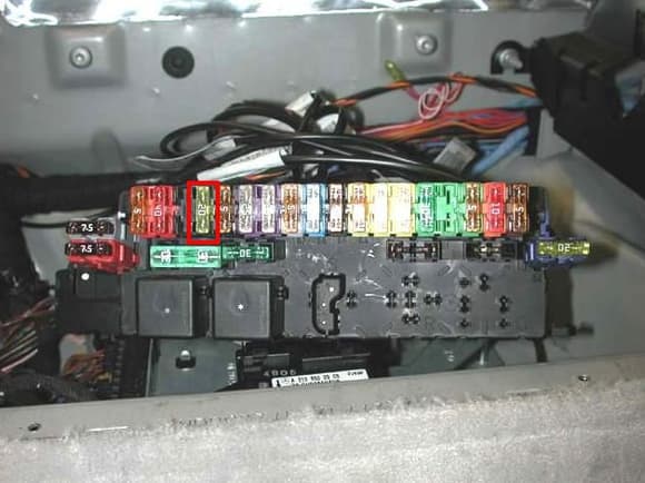 It is the 20 amp fuse inside the red markings that was blown and when a new fuse is put in the fuse blows straight away