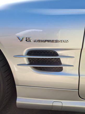 Supercharged emblem "Kompressor"