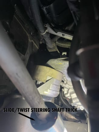 This is the driver's side mount, from below, and the picture also shows the intermediate steering shaft.  It comes apart to move out of the way -- a great trick that would make swapping the mount impossible, otherwise.