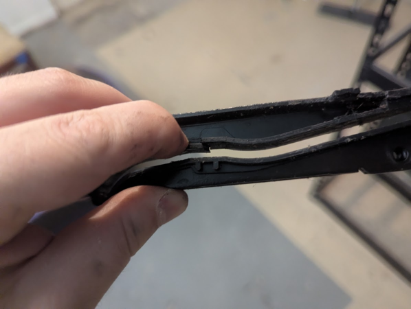 Sunroof rail with cracked plastic guide