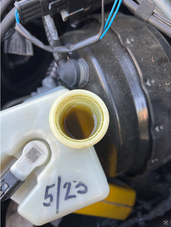 SL400 two year old brake fluid.  Dark color.