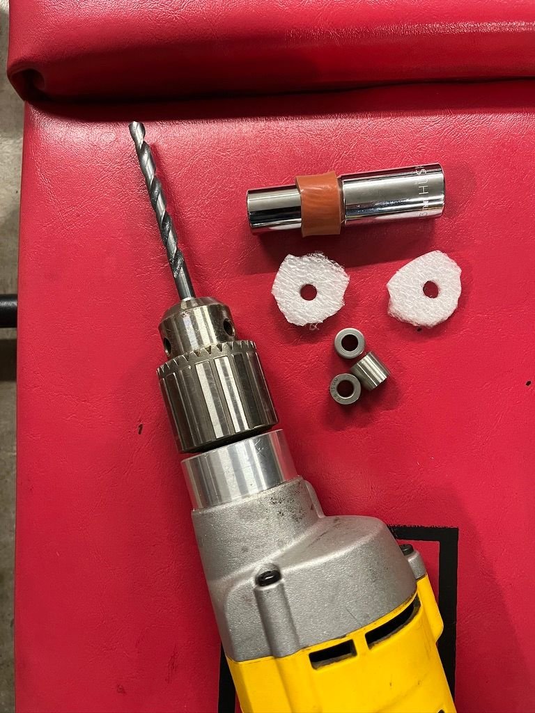 13mm long reach socket, 6.75mm drill bushings, Silicone sleeve on socket, foam spacers.