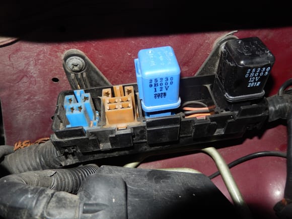 Once I removed the lid it appears 2 what I think are relays are missing. I have no dash lights, no tail lights and given what is says on the lid I figure this is why. It appears there are 2 missing.