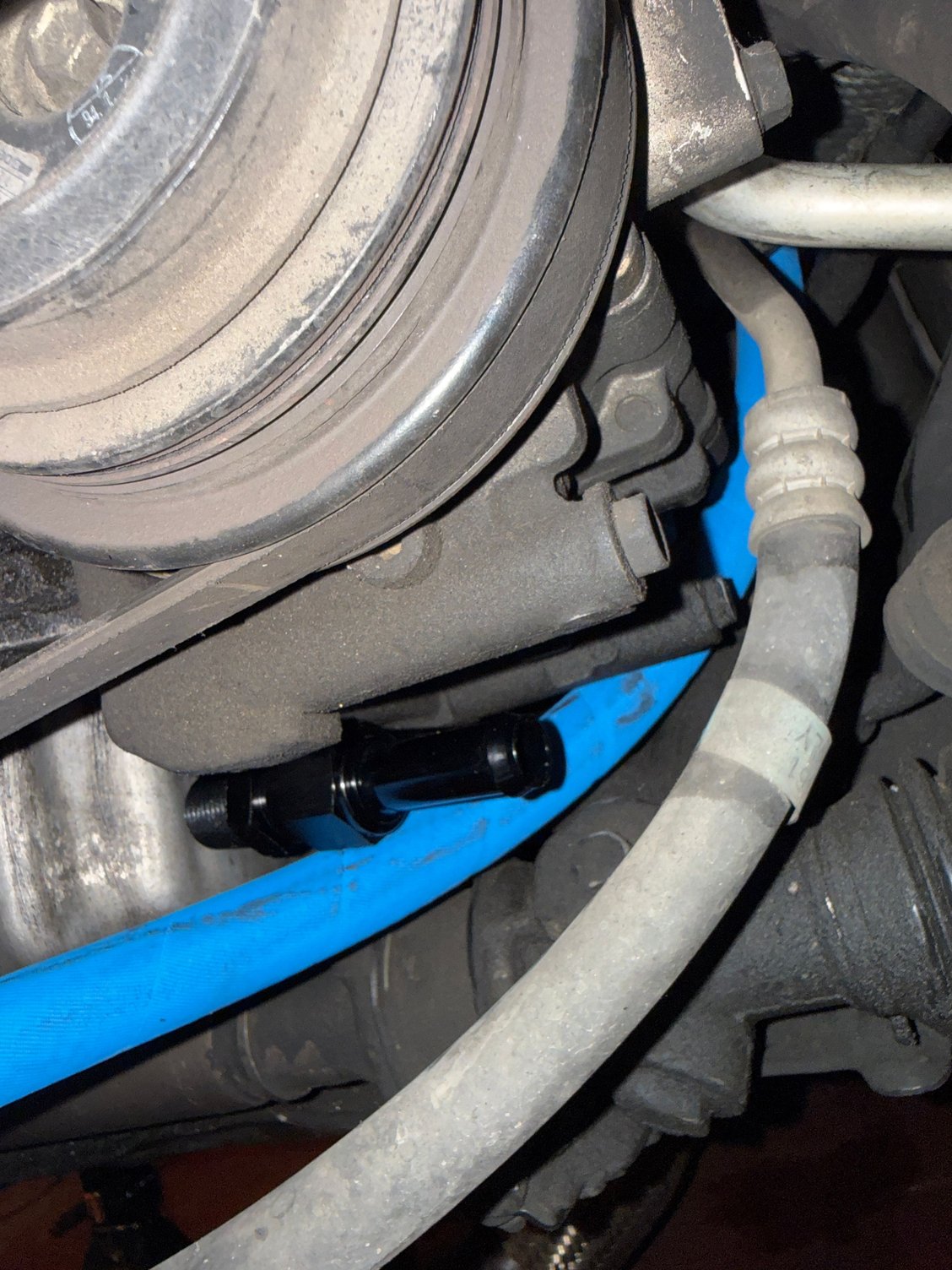 Roughly the angle of attack the hose would come down through the engine bay. 