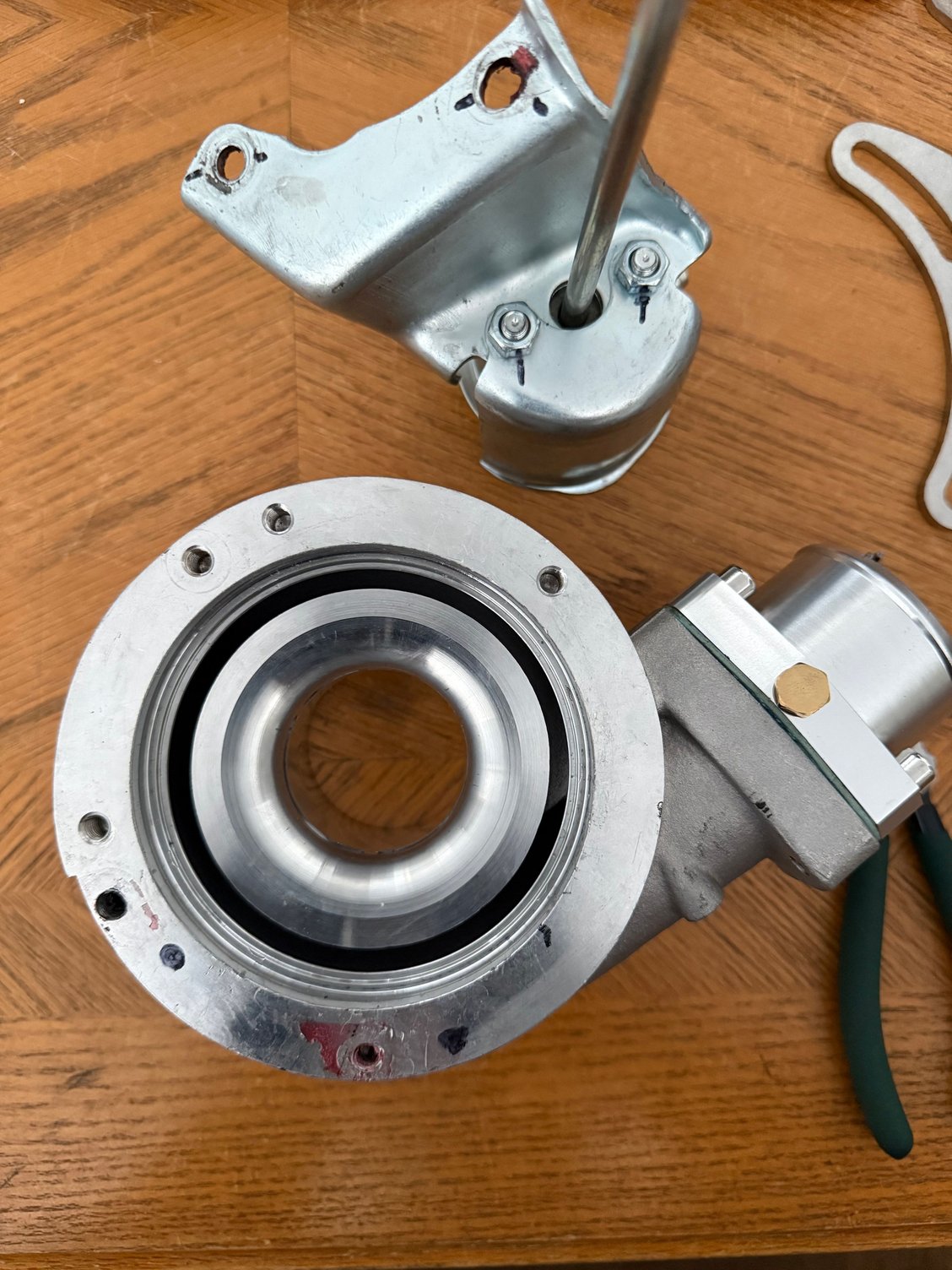 Had to reclock the turbo again and hated drilling new holes for the wastegate bracket. 